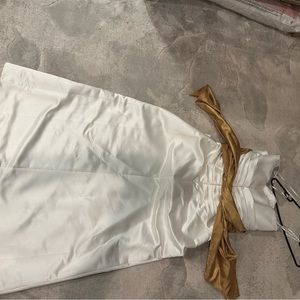 White dress with gold sash